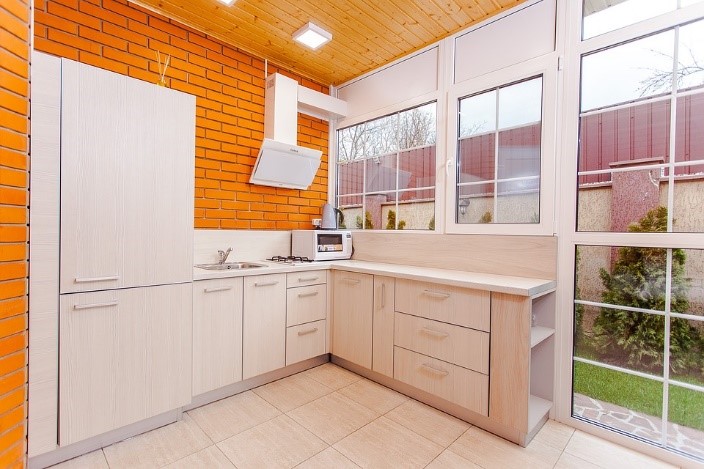 Orange Block Brick Wallled Kitchen