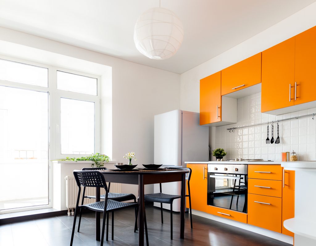 Contemporary kitchen with white walls