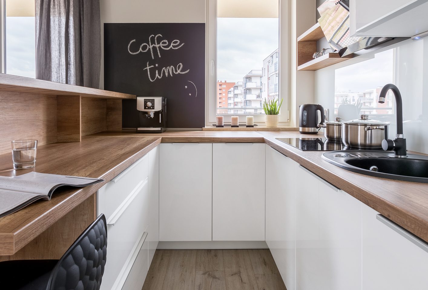kitchen with a coffee time sign