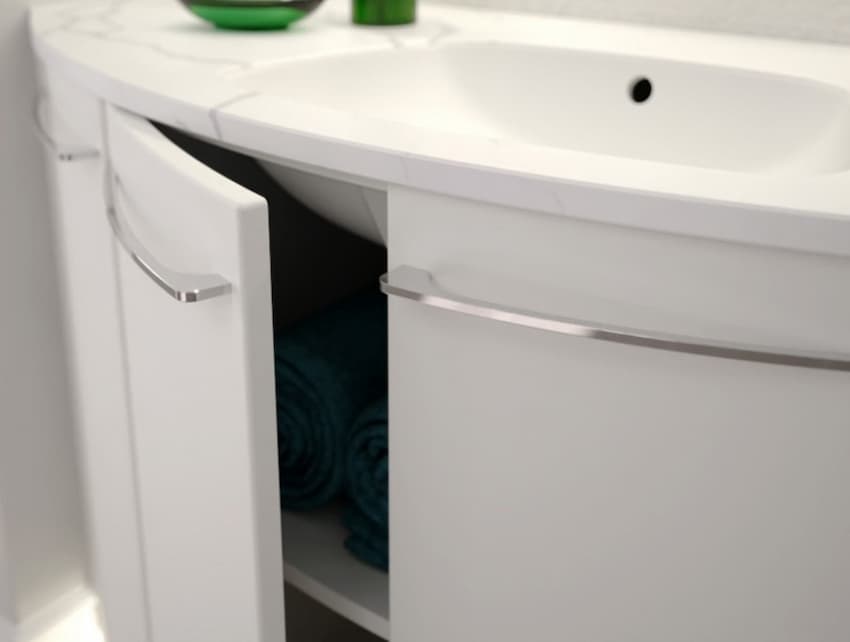 A bathroom sink with a towel under it