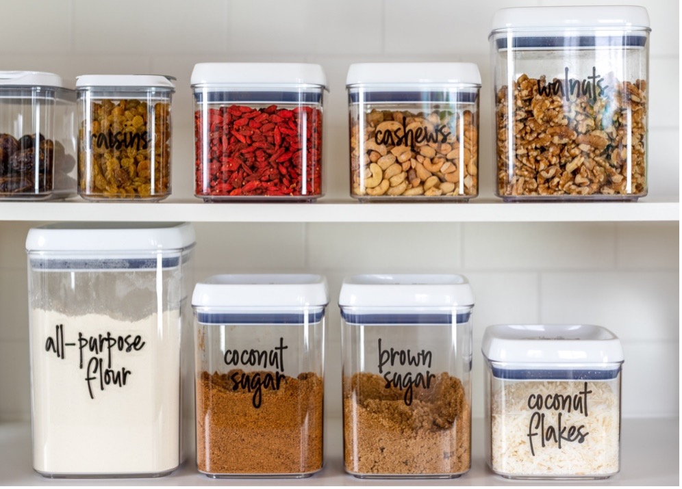 A shelf with containers of food