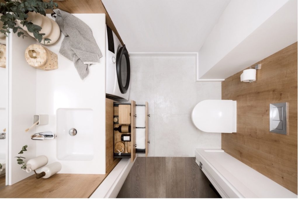 A bathroom with a sink and toilet